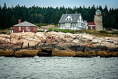 Whitehead Lighthouse on Rocky Edge in Maine